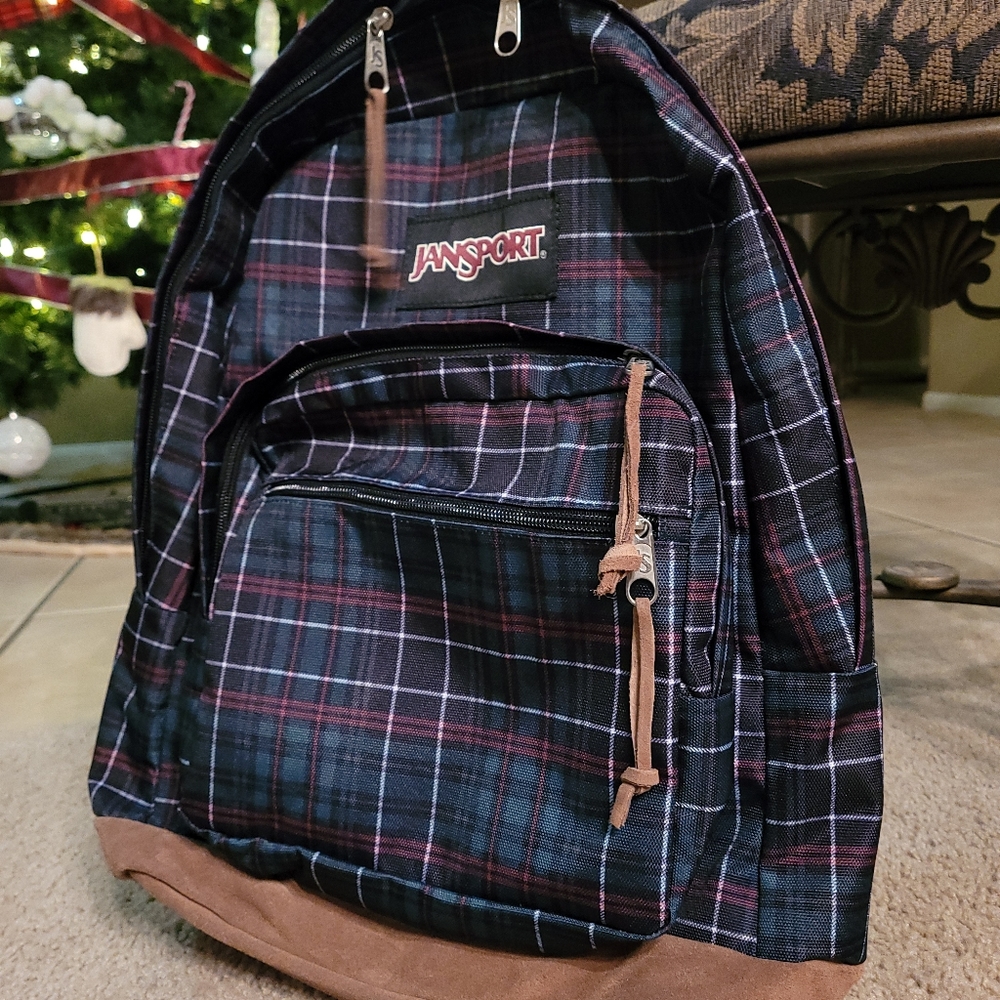 Jansport backpack plaid flannel leather bottom